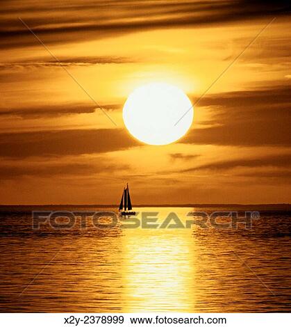Stock Photo - Sunset sail, Cape Cod, MA.. Fotosearch