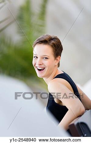 Surprised teenager girl looking back View Large Photo Image Stock Image - Surprised teenager girl looking back. Fotosearch