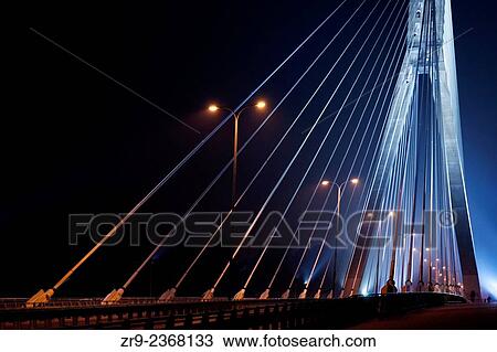 Swietokrzyski bridge illuminated at night, Warsaw, Poland, Central Europe. View Large Photo Image Stock Image - Swietokrzyski bridge illuminated at night, Warsaw, Poland, Central Europe.. Fotosearch