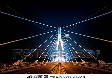 Swietokrzyski bridge illuminated at night with advertising balloon in sky, Warsaw, Poland, Central Europe. View Large Photo Image Stock Photography - Swietokrzyski bridge illuminated at night with advertising balloon in sky, Warsaw, Poland, Central Europe.. Fotosearch