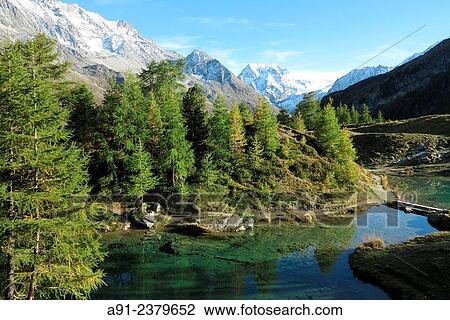 Stock Image - Switzerland, Valais, Val d? Herens, village of Evolene.. Fotosearch