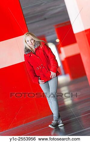 Stock Photograph - Teen girl in empty larking lot. Fotosearch