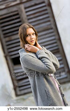 Teenager girl outdoors dressed in coat and pants. View Large Photo Image Stock Photo - Teenager girl outdoors dressed in coat and pants.. Fotosearch