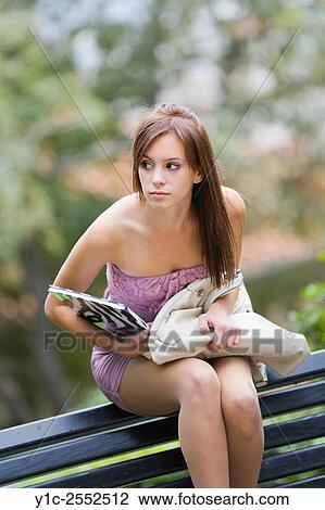 Teenager with notebook in hand is expecting someone View Large Photo Image Stock Image - Teenager with notebook in hand is expecting someone. Fotosearch