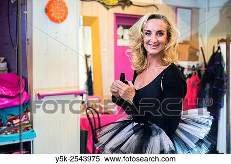 The Hague, Netherlands. 54 year old female teacher of classical ballet and street dance during preparation for a class. View Large Photo Image Stock Photography - The Hague, Netherlands. 54 year old female teacher of classical ballet and street dance during preparation for a class.. Fotosearch