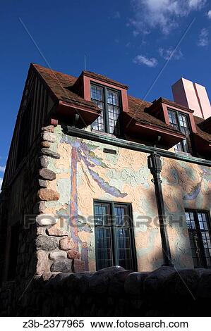 Stock Photography - The local Dow Chemical Company invented a magnesite stucco for the unique exterior and murals on the Midland Courthouse, Midland, Michigan, USA.. Fotosearch