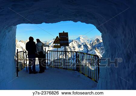 Stock Photograph - The Mont Blanc massif, Chamonix, Aiguille du Midi, France, Europe.. Fotosearch