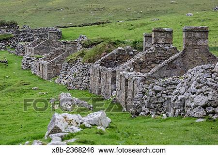 The stone remains of the evacuated village on St. Kilda, declared a nature reserve in 1957, Hirta, St. Kilda Archipelago, Scotland. View Large Photo Image Stock Photograph - The stone remains of the evacuated village on St. Kilda, declared a nature reserve in 1957, Hirta, St. Kilda Archipelago, Scotland.. Fotosearch