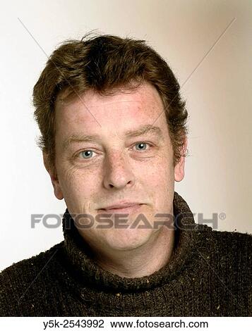 Tilburg, Netherlands. Studio-portrait of a 40 year old caucasian male. View Large Photo Image Stock Image - Tilburg, Netherlands. Studio-portrait of a 40 year old caucasian male.. Fotosearch