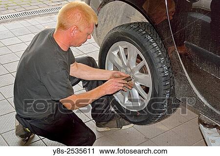 Tire Change. View Large Photo Image Stock Image - Tire Change.. Fotosearch