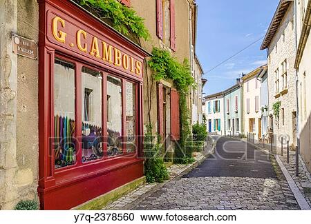 Traditional shop in the medieval town of Saint-Macaire, Gironde, France. View Large Photo Image Stock Image - Traditional shop in the medieval town of Saint-Macaire, Gironde, France.. Fotosearch