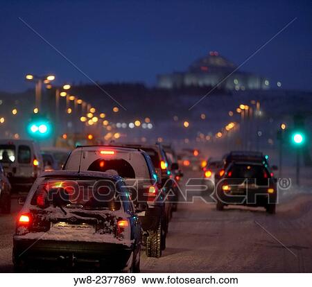 Stock Photo - Traffic during a snowstorm, Reykjavik, Iceland.. Fotosearch