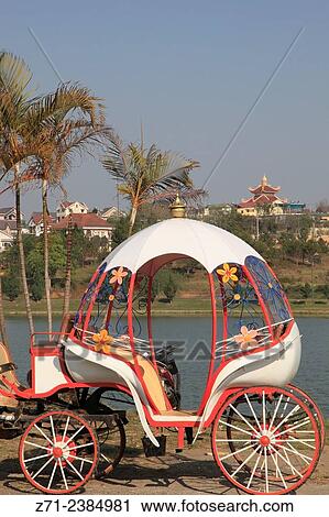 Vietnam, Dalat, horse carriage, Xuan Huong Lake. View Large Photo Image Stock Image - Vietnam, Dalat, horse carriage, Xuan Huong Lake.. Fotosearch