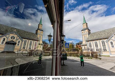 View of the city and Norwegian church in Tromso, known as the Gateway to the Arctic, Norway. View Large Photo Image Picture - View of the city and Norwegian church in Tromso, known as the Gateway to the Arctic, Norway.. Fotosearch
