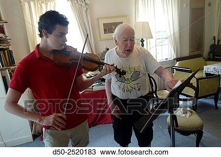 Violin lesson, grandpa and grandson, Washington D. C., USA View Large Photo Image Stock Image - Violin lesson, grandpa and grandson, Washington D. C., USA. Fotosearch