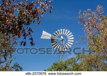 Windmill at station near the Ord River, Kimberley, Western Australia, Australia. View Large Photo Image Stock Photograph - Windmill at station near the Ord River, Kimberley, Western Australia, Australia.. Fotosearch