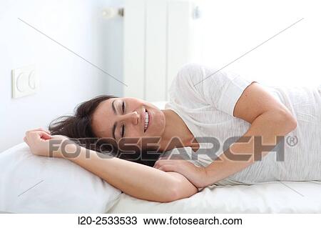 Woman in bed View Large Photo Image Stock Image - Woman in bed. Fotosearch