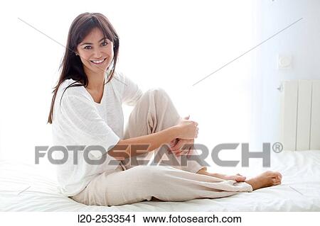 Woman in bed View Large Photo Image Stock Image - Woman in bed. Fotosearch
