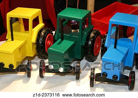 Stock Photograph - wooden toy tractors.. Fotosearch