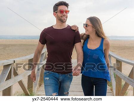 Picture - Young couple outdoors.. Fotosearch