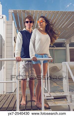 Stock Image - Young couple outdoors.. Fotosearch