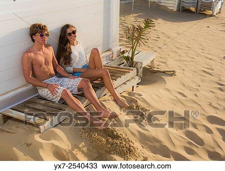 Stock Image - Young couple outdoors.. Fotosearch