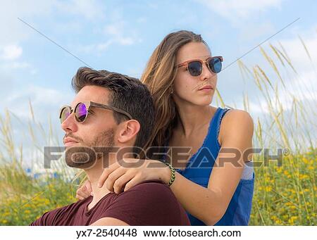 Stock Photo - Young couple outdoors.. Fotosearch
