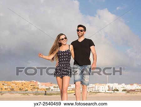 Stock Photo - Young couple outdoors.. Fotosearch