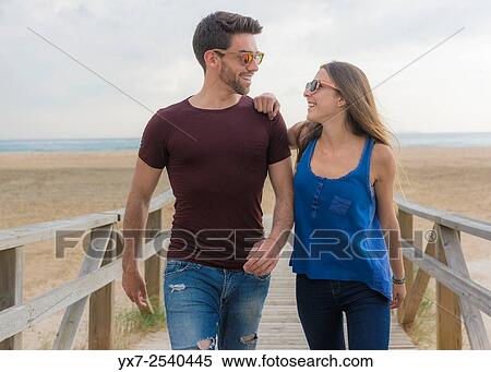 Stock Photography - Young couple outdoors.. Fotosearch