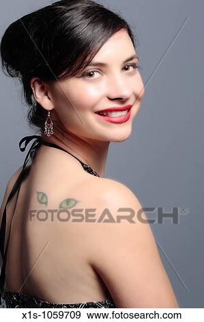 Stock Photo - 20-something Model with interesting tattoo. Fotosearch