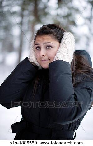 20-something, olive skinned, long hair girl outside in winter View Large Photo Image Stock Image - 20-something, olive skinned, long hair girl outside in winter. Fotosearch