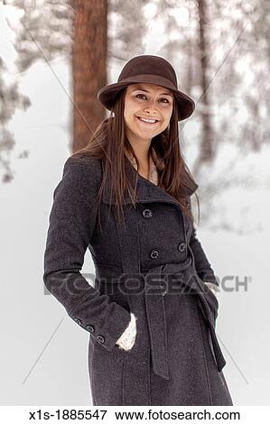20-something, olive skinned, long hair girl outside in winter View Large Photo Image Stock Photo - 20-something, olive skinned, long hair girl outside in winter. Fotosearch