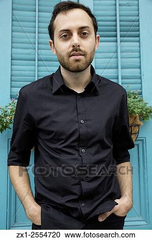 3/4 length portrait of a man wearing formal shirt with a blue-green backdrop. View Large Photo Image Stock Image - 3/4 length portrait of a man wearing formal shirt with a blue-green backdrop.. Fotosearch