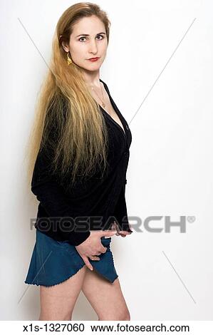 3/4 length pose of a 30-something attractive woman View Large Photo Image Stock Image - 3/4 length pose of a 30-something attractive woman. Fotosearch