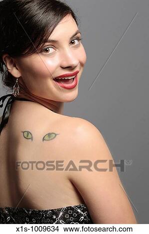 A 20-something attactive female in a sleeveless dress with a red ribbon in her hair and expressive hand gestures View Large Photo Image Picture - A 20-something attactive female in a sleeveless dress with a red ribbon in her hair and expressive hand gestures. Fotosearch