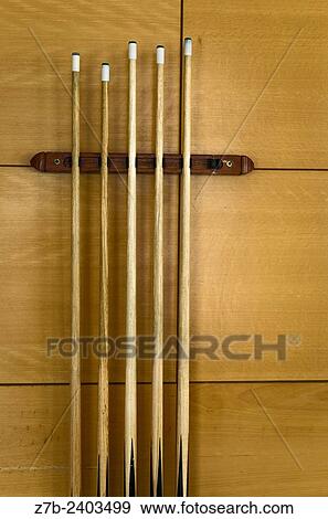 A billiard sticks in a hotel of Albir, Alicante province, Spain. View Large Photo Image Stock Photo - A billiard sticks in a hotel of Albir, Alicante province, Spain.. Fotosearch