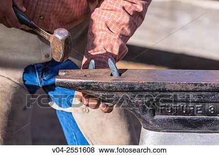 A horseshoer (blacksmith) at his job, California, USA View Large Photo Image Stock Photo - A horseshoer (blacksmith) at his job, California, USA. Fotosearch