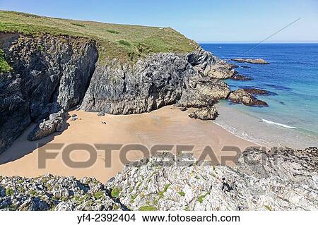 A sandy cove next to Porth Joke or Polly Joke beach near to Crantock Cornwall South West England UK. View Large Photo Image Picture - A sandy cove next to Porth Joke or Polly Joke beach near to Crantock Cornwall South West England UK.. Fotosearch