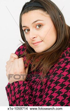 A young woman dressed for cold weather View Large Photo Image Picture - A young woman dressed for cold weather. Fotosearch