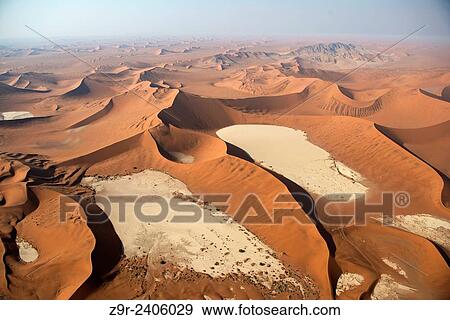 Aerial view of the dunes of the Namib Naukluft, the oldest desert in the world. Namibia. View Large Photo Image Stock Photo - Aerial view of the dunes of the Namib Naukluft, the oldest desert in the world. Namibia.. Fotosearch