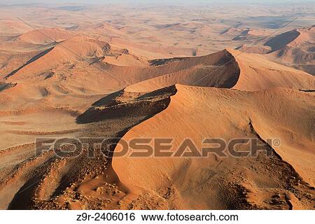 Aerial view of the dunes of the Namib Naukluft, the oldest desert in the world. Namibia. View Large Photo Image Stock Photograph - Aerial view of the dunes of the Namib Naukluft, the oldest desert in the world. Namibia.. Fotosearch