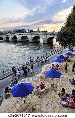 artificial beach on the Seine bank during the Paris-Plages operation, Paris, Ile de France region, France, Europe. View Large Photo Image Stock Photo - artificial beach on the Seine bank during the Paris-Plages operation, Paris, Ile de France region, France, Europe.. Fotosearch