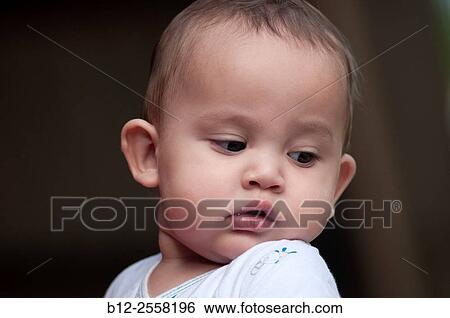 Stock Photograph - Baby - boy - 12 months - portrait. Fotosearch