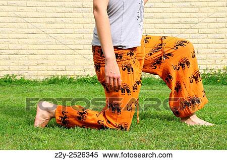 Body with knee on the ground. View Large Photo Image Stock Photography - Body with knee on the ground.. Fotosearch