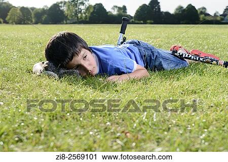 Stock Image - Boy, 7, in the park.. Fotosearch