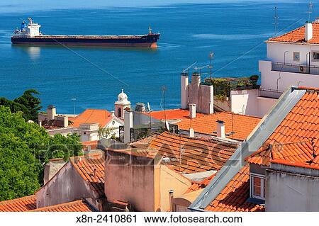 Stock Image - Cityscape and Tagus River from castle of Sao Jorge (Castelo de Sao Jorge), Lisbon, Portugal.. Fotosearch