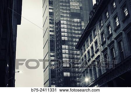 Stock Image - Closeup of a modern and clasical architecture office buildings in Bishops Gate in City of London, England, UK, Europe.. Fotosearch