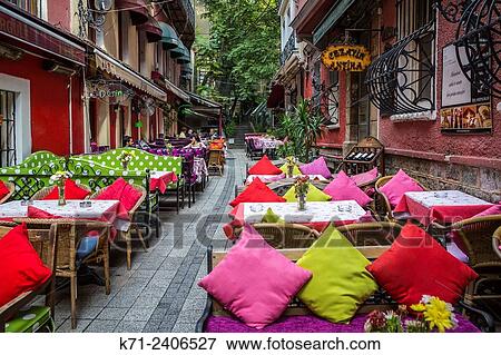 Colorful restaurants with tables and chairs and the unique Cezayir or French Street in Taksim, Istanbul, Turkey, Eurasia. View Large Photo Image Stock Photo - Colorful restaurants with tables and chairs and the unique Cezayir or French Street in Taksim, Istanbul, Turkey, Eurasia.. Fotosearch