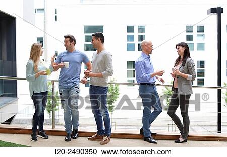 Executives drinking coffee. Break. View Large Photo Image Stock Image - Executives drinking coffee. Break.. Fotosearch