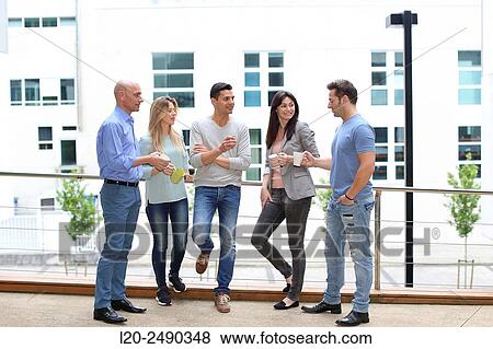 Executives drinking coffee. Break. View Large Photo Image Stock Photo - Executives drinking coffee. Break.. Fotosearch